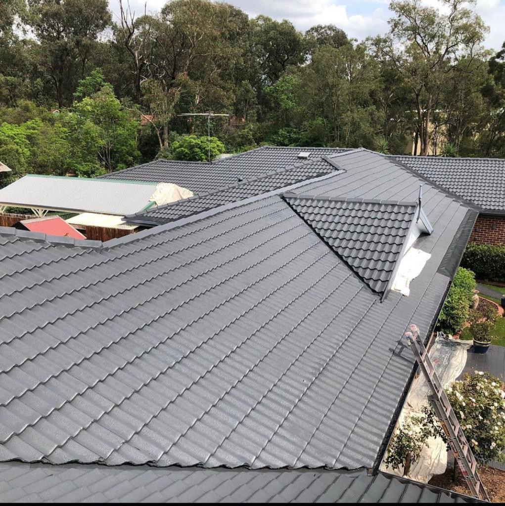 Concrete tile roof freshly re-coated in charcoal